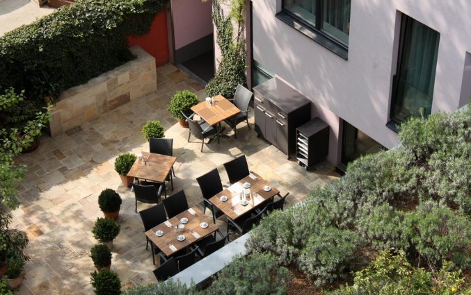 Buitenterras van hotel Boutique Stadthalle in Wenen