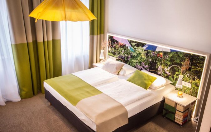 Tweepersoonsbed van hotel Boutique Stadthalle in Wenen