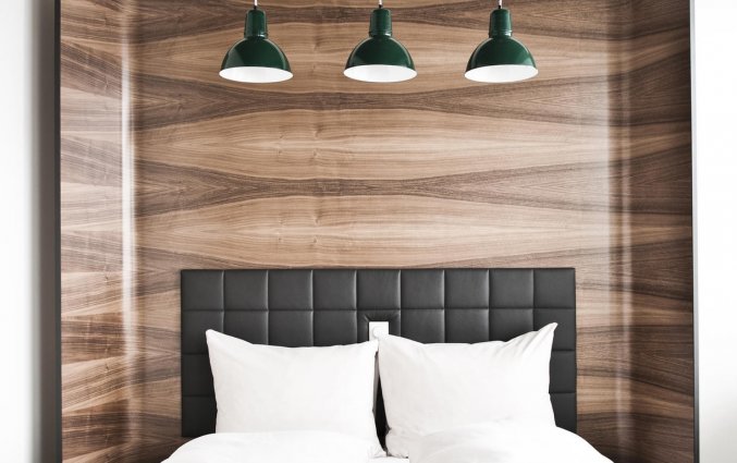 Standaard kamer met bedden van hotel Daniel Vienna in Wenen