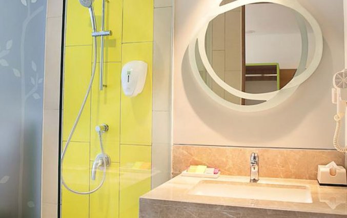 Badkamer van een tweepersoonskamer van Hotel Grand Livio op Bali