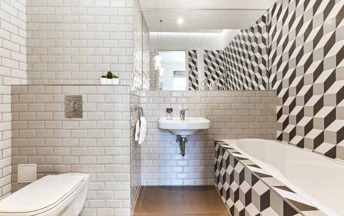 Badkamer van Hotel en Apartments The Magazine