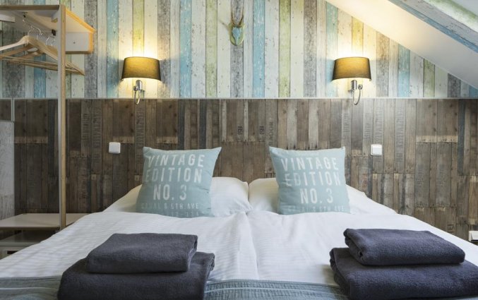 Tweepersoonskamer met een tweepersoonsbed van Hotel Royal Court in Praag