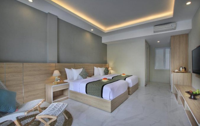 Slaapkamer van hotel Tapa Tepi Kali in Bali