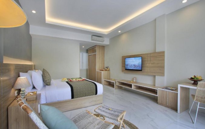 Slaapkamer van hotel Tapa Tepi Kali in Bali