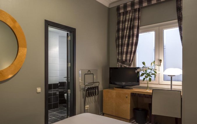 Slaapkamer van hotel Room Mate Larios in Malaga