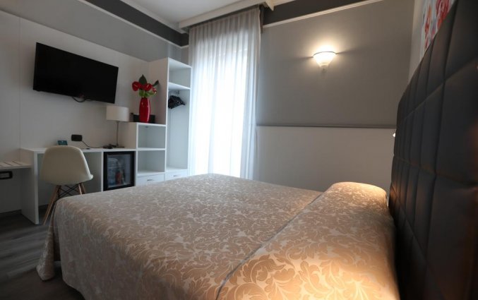 Tweepersoonskamer van hotel Italia Verona