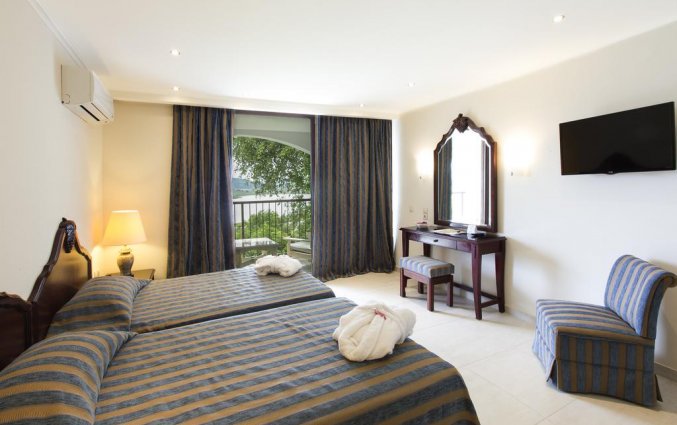Slaapkamer van hotel Corfu Holiday Palace in Corfu