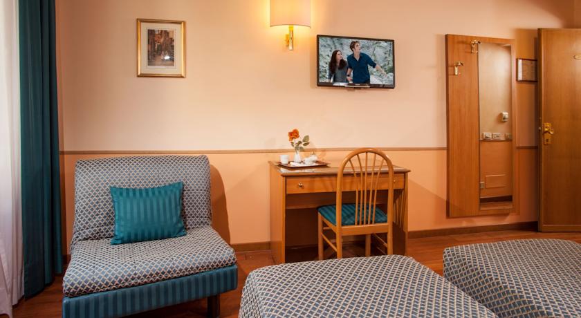 Slaapkamer van hotel Piemonte in Rome