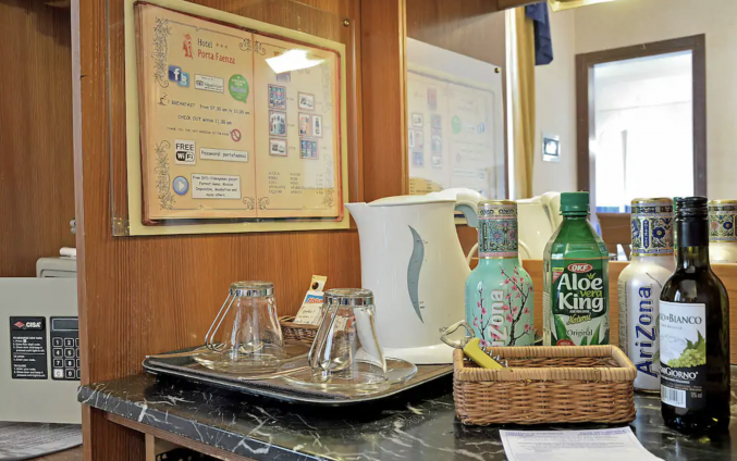 Slaapkamer in Hotel Porta Faenza