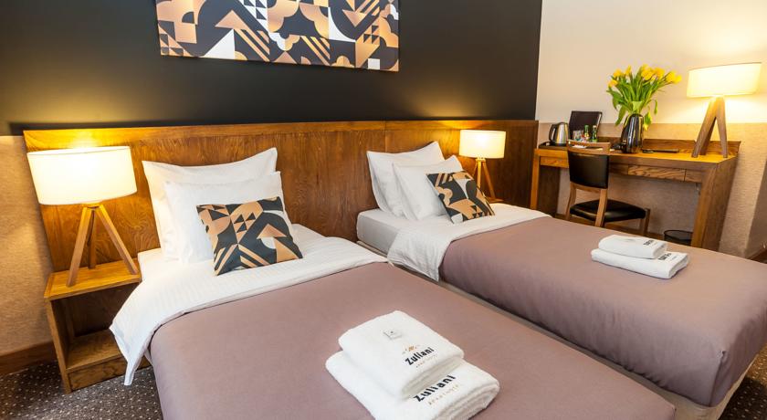 Tweepersoonskamer van aparthotel Yarden in Krakau