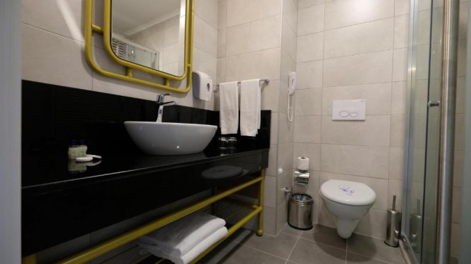 Badkamer van een tweepersoonskamer van Resort en Spa Seaden Valentine in Side