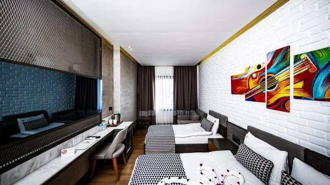 Slaapkamer van Hotel & Spa Laren Family in Antalya