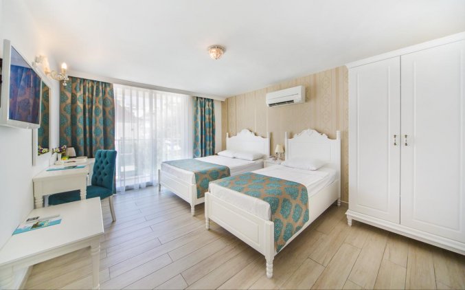 Slaapkamer van Hotel Kleopatra Atlas in Alanya