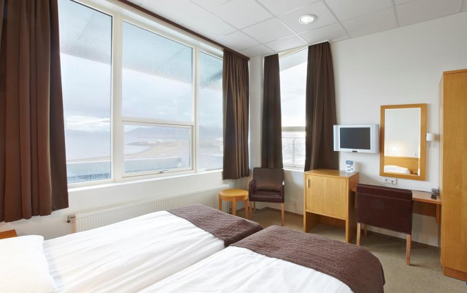 Tweepersoonskamer van hotel cabin in IJsland