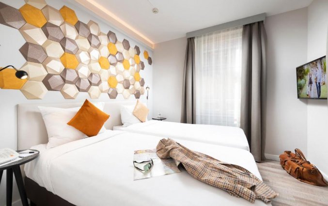 Tweepersoonskamer van The Three Corners Hotel Art Budapest