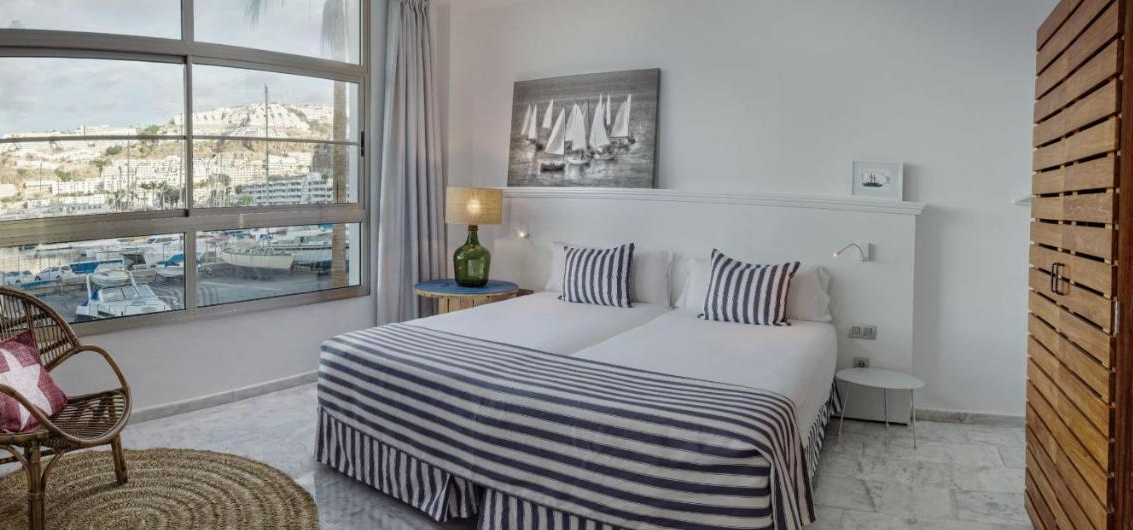 Slaapkamer Marina Suites Puerto Rico