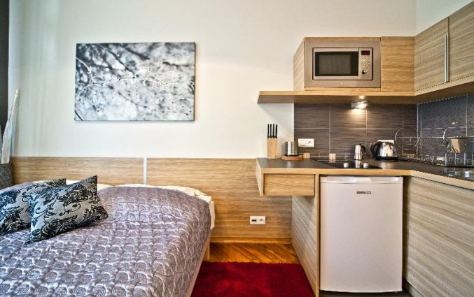 Slaapkamer van een appartement van Appartementen 4Seasons in Krakau