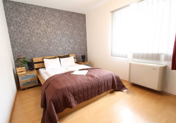 Slaapkamer van een appartement van Opera Residence in Budapest