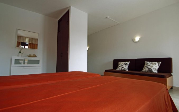 Tweepersoonskamer van appartementen Caribe