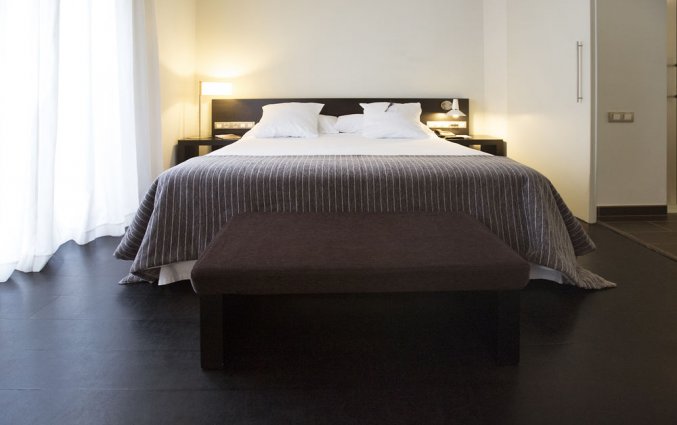 Slaapkamer van hotel Hospes Palau de La Mar in Valencia