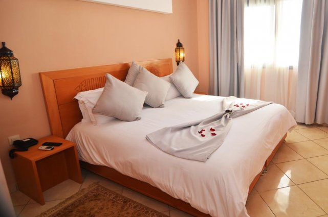 Een tweepersoonsbed van Aparthotel Atlantic Palm Beach Agadir