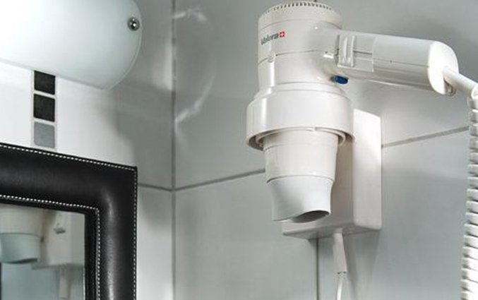 Badkamer van een tweepersoonskamer van Hotel Dodo in Riga