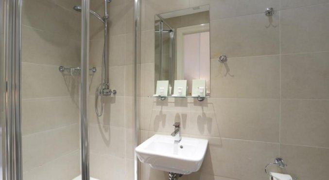 Badkamer van een tweepersoonskamer van Hotel Hyde Park Boutique in Londen