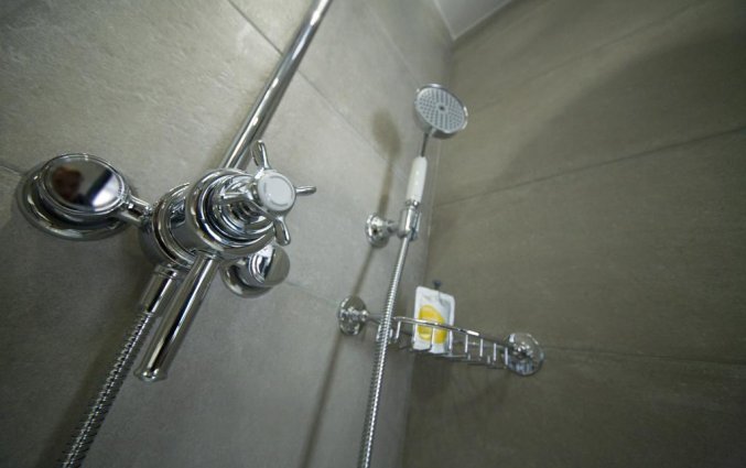 Badkamer van een tweepersoonskamer van Hotel House of Toby in Londen