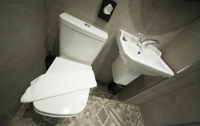 Badkamer van een tweepersoonskamer van Hotel House of Toby in Londen